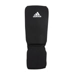 Svarta Adidas ben- och vristskydd för kickboxning och thaiboxning