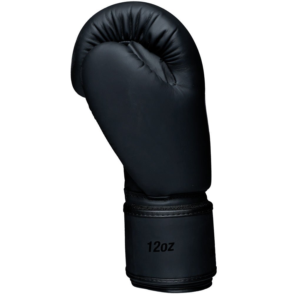 Svarta Budo-Nord Fight Gear Cross boxningshandskar med naturlig handposition och stötdämpning, sedda från vänster sida
