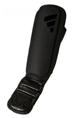 Svarta Adidas Combat 50 ben- och vristskydd med två kardborreband och elastisk fotdel