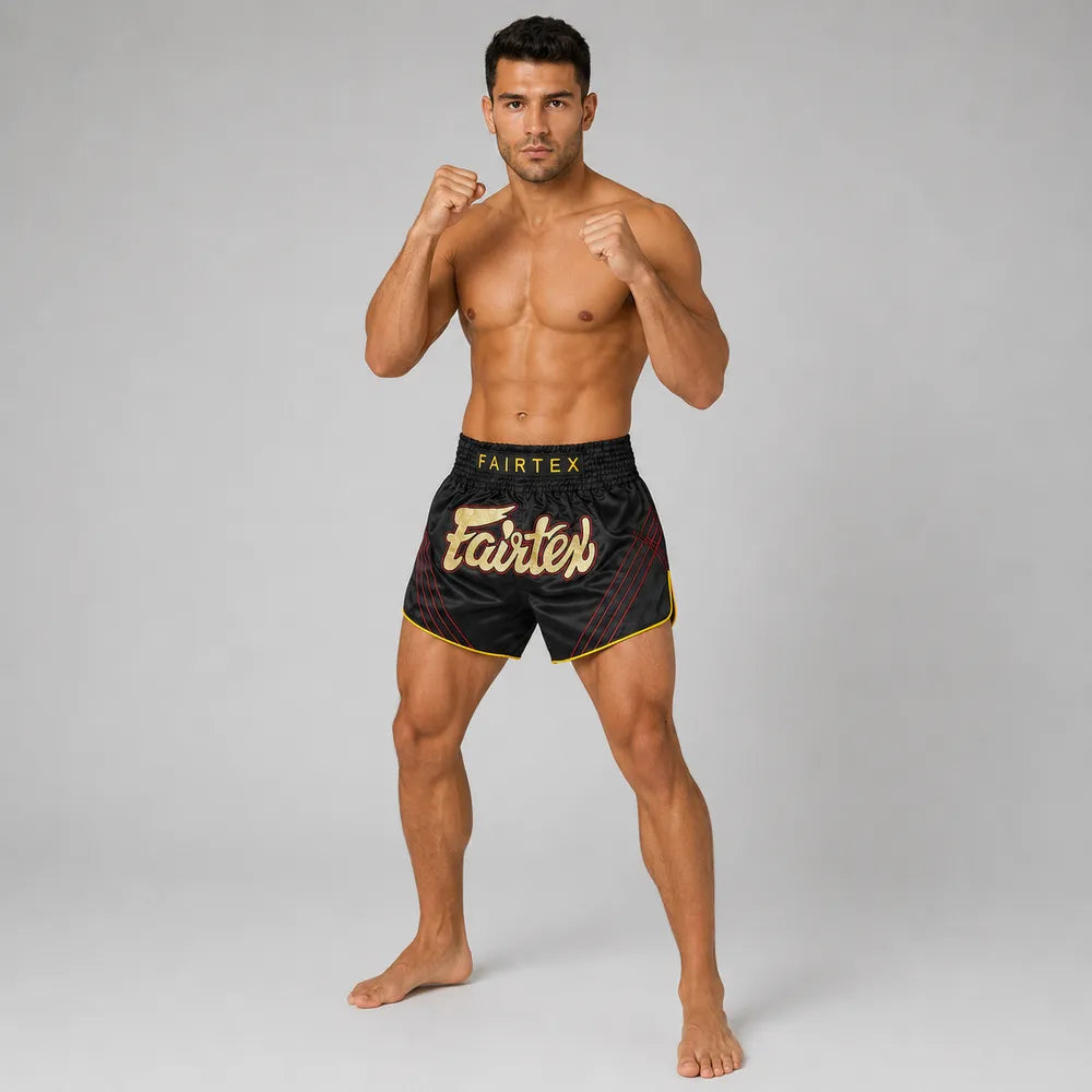 Svarta Fairtex Mr X BS1925 thaishorts med rörelsefrihet för sparkar och knän