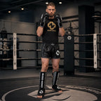 Svarta och vita Budo-Nord Fight Gear Cross Gen 2 boxningshandskar för teknikdrillar och säckpass
